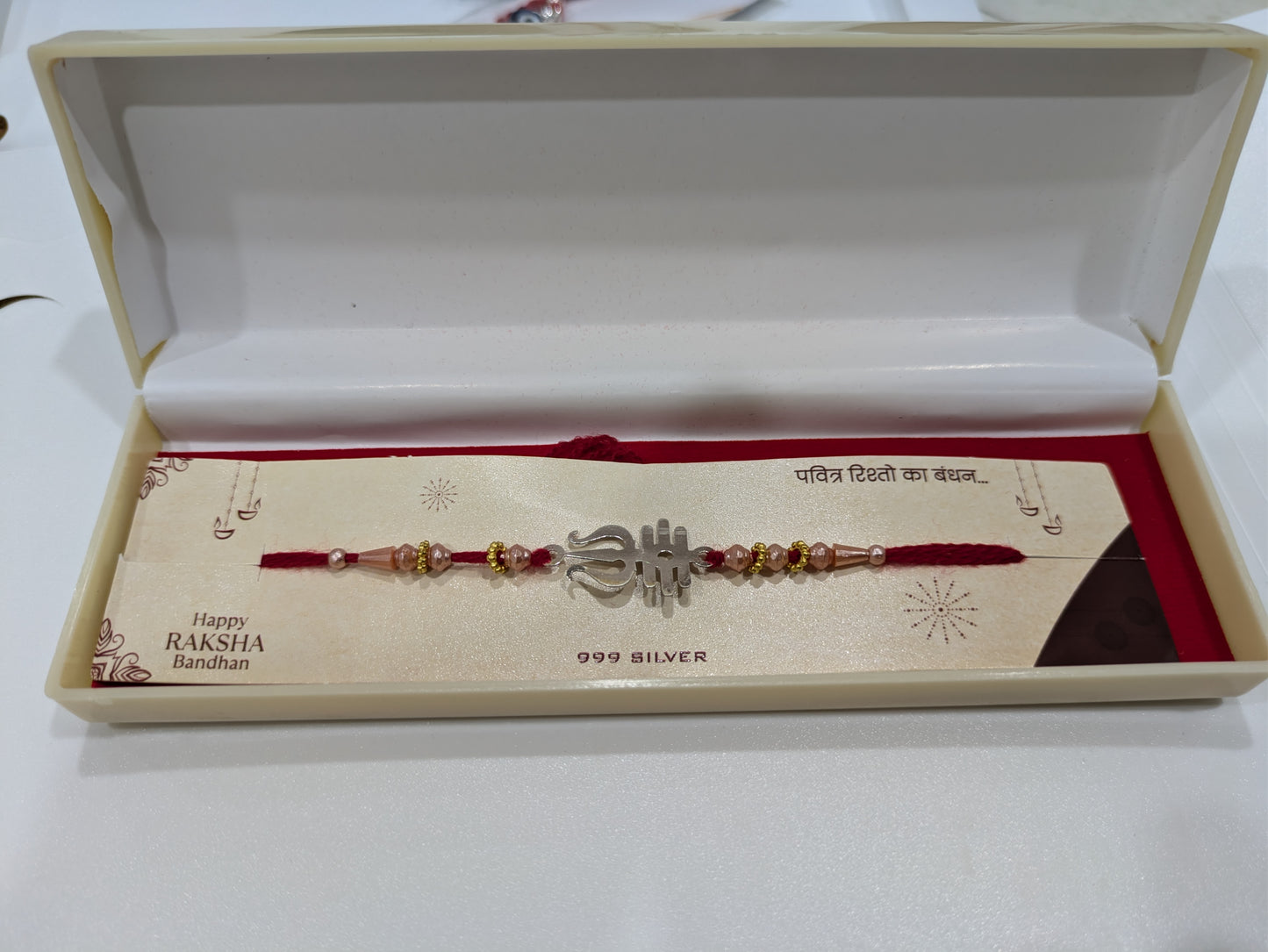 Elegant Silver Rakhi with Trishul Motif