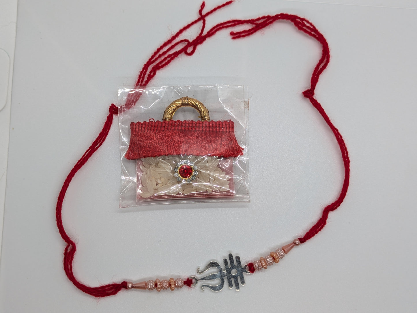 Elegant Silver Rakhi with Trishul Motif