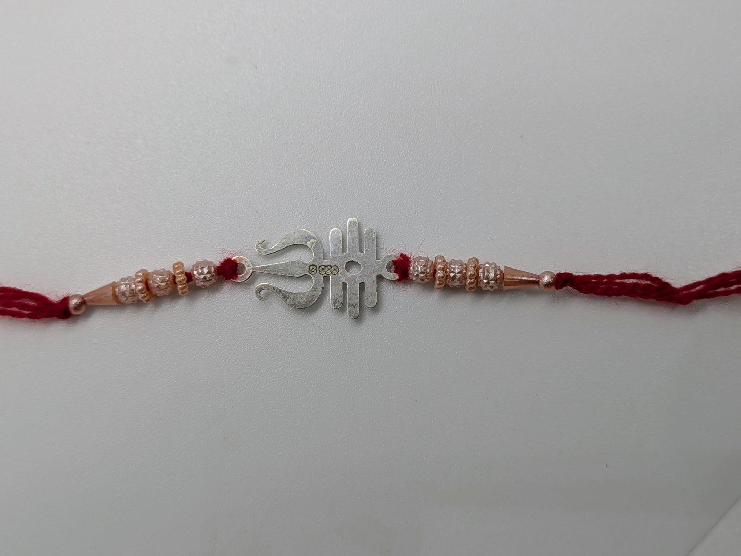 Elegant Silver Rakhi with Trishul Motif